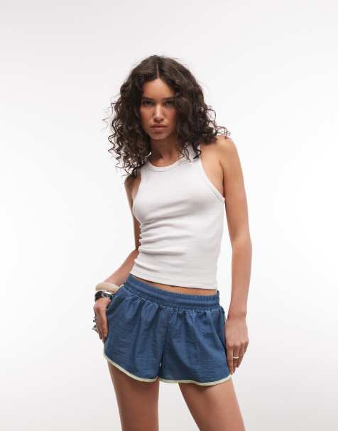COLLUSION contrast nylon runner shorts in teal - view 1
