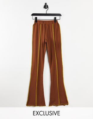 COLLUSION contrast seam detail flare in brown - ASOS Price Checker