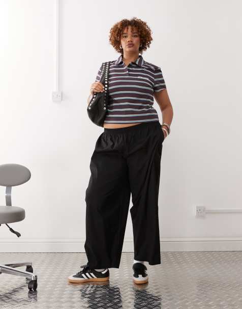 COLLUSION Curve relaxed woven balloon pants in black - view 1