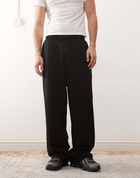 COLLUSION Relaxed skate joggers in black