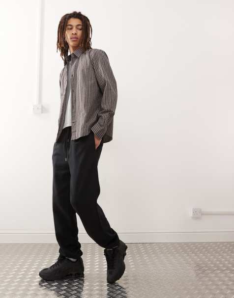 COLLUSION joggers in black