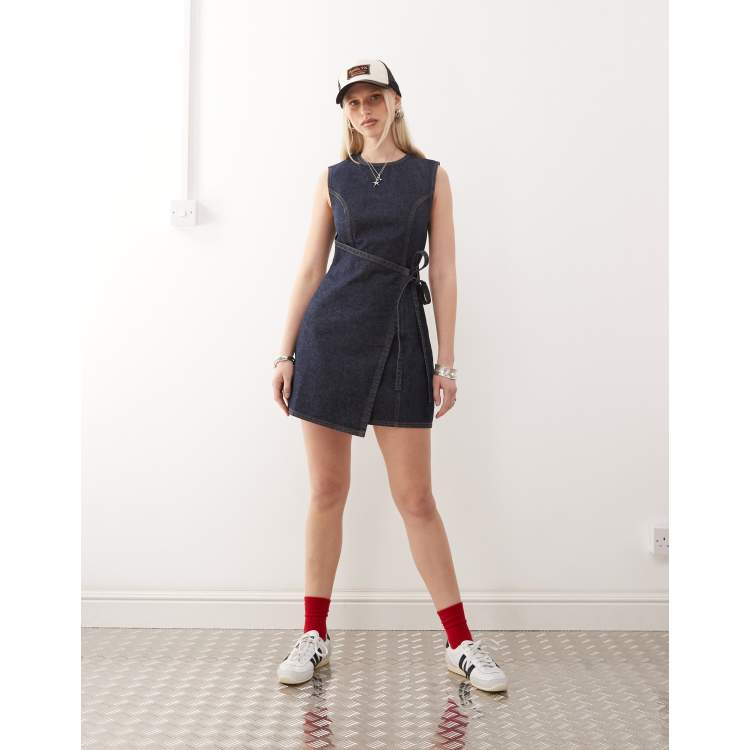 COLLUSION denim mini dress with wrap detail in rinse wash