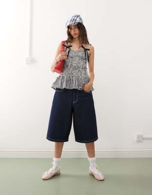 denim skater jorts with contrast stitching in mid blue