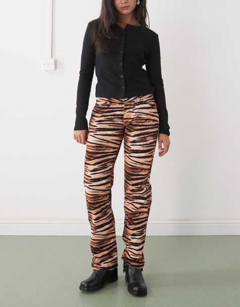 COLLUSION low waist slim bootcut jean in tiger print