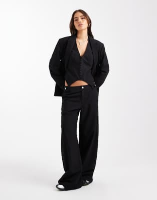 COLLUSION - Elegante Relaxed Fit Hose in Schwarz mit niedrigem Bund