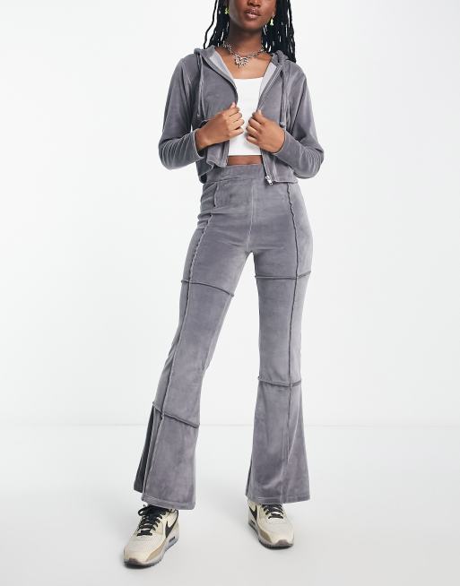 COLLUSION exposed seam velvet flare joggers in grey ASOS