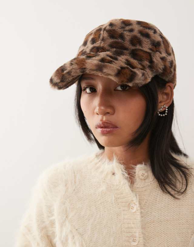 COLLUSION faux fur cap in leopard print | ASOS