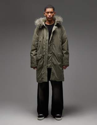 Collusion Faux Fur Lined Longline Parka In Green