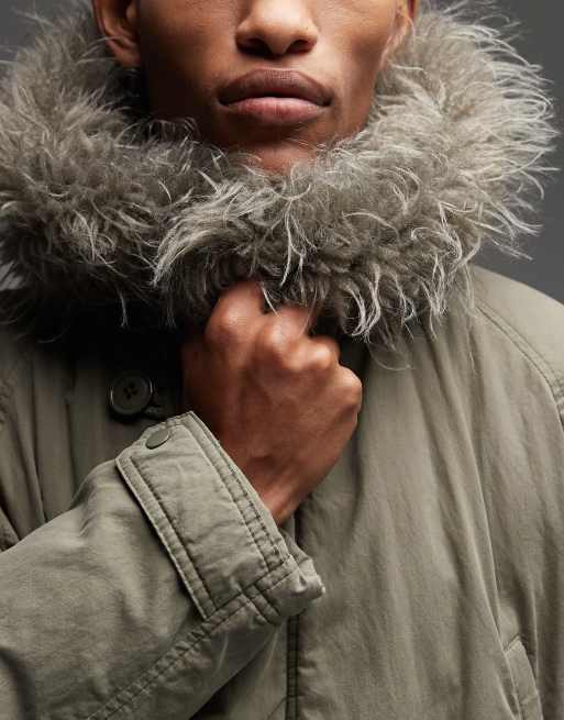 COLLUSION faux fur lined longline parka in khaki green | ASOS