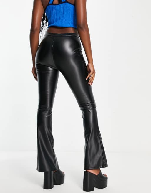 Tight black flared store trousers