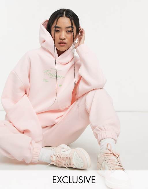 COLLUSION - Felpa oversize con cappuccio rosa pallido in coordinato