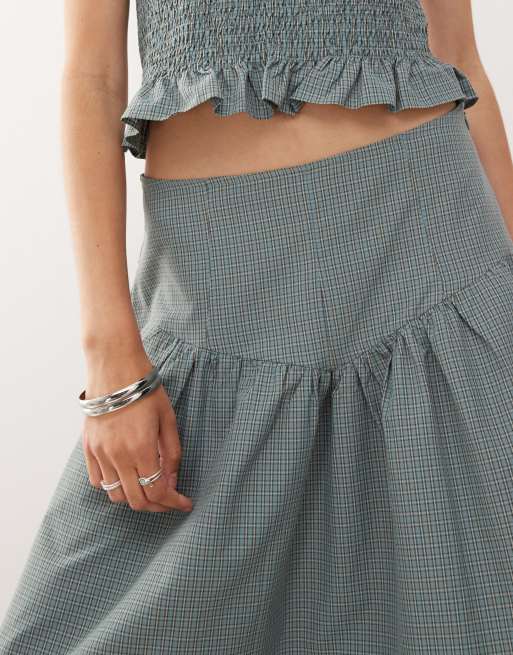 COLLUSION festival dropped waist midi skirt in green check