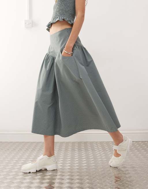COLLUSION festival dropped waist midi skirt in green check