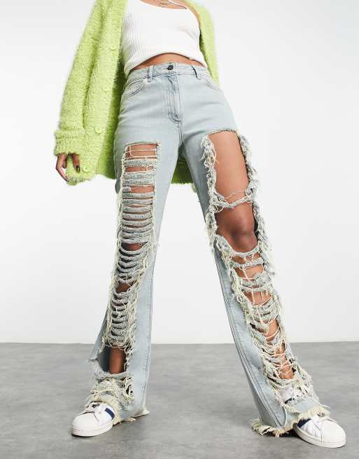 COLLUSION festival extreme rip Y2K flare jeans in blue ASOS