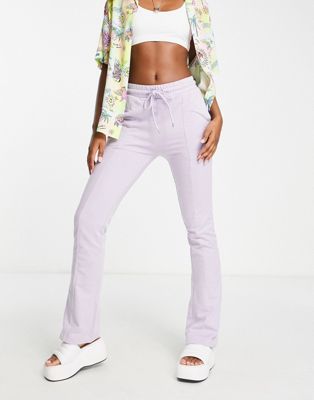 COLLUSION flared trackies in lilac - ASOS Price Checker
