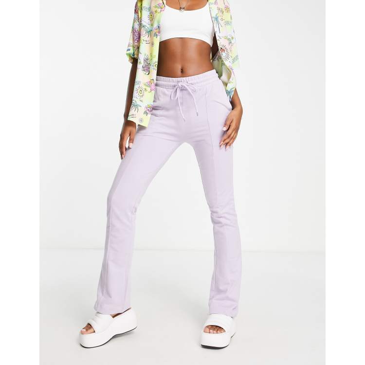 https://images.asos-media.com/products/collusion-flared-sweatpants-in-lilac/202046305-1-lilac?$n_750w$&wid=750&hei=750&fit=crop