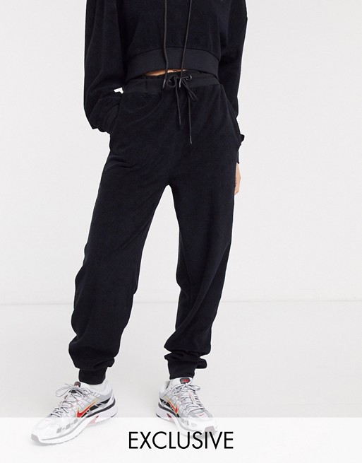 COLLUSION fleece tracksuit joggers in black