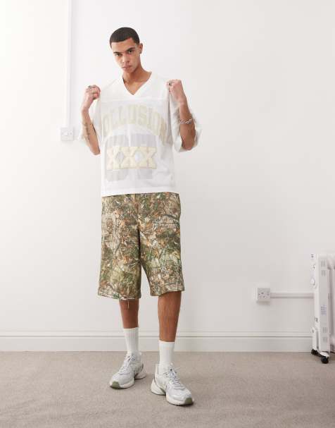 COLLUSION – Flerfärgade, kamouflagemönstrade jersey-shorts i avslappnad skaterstil med trädmönster - view 1
