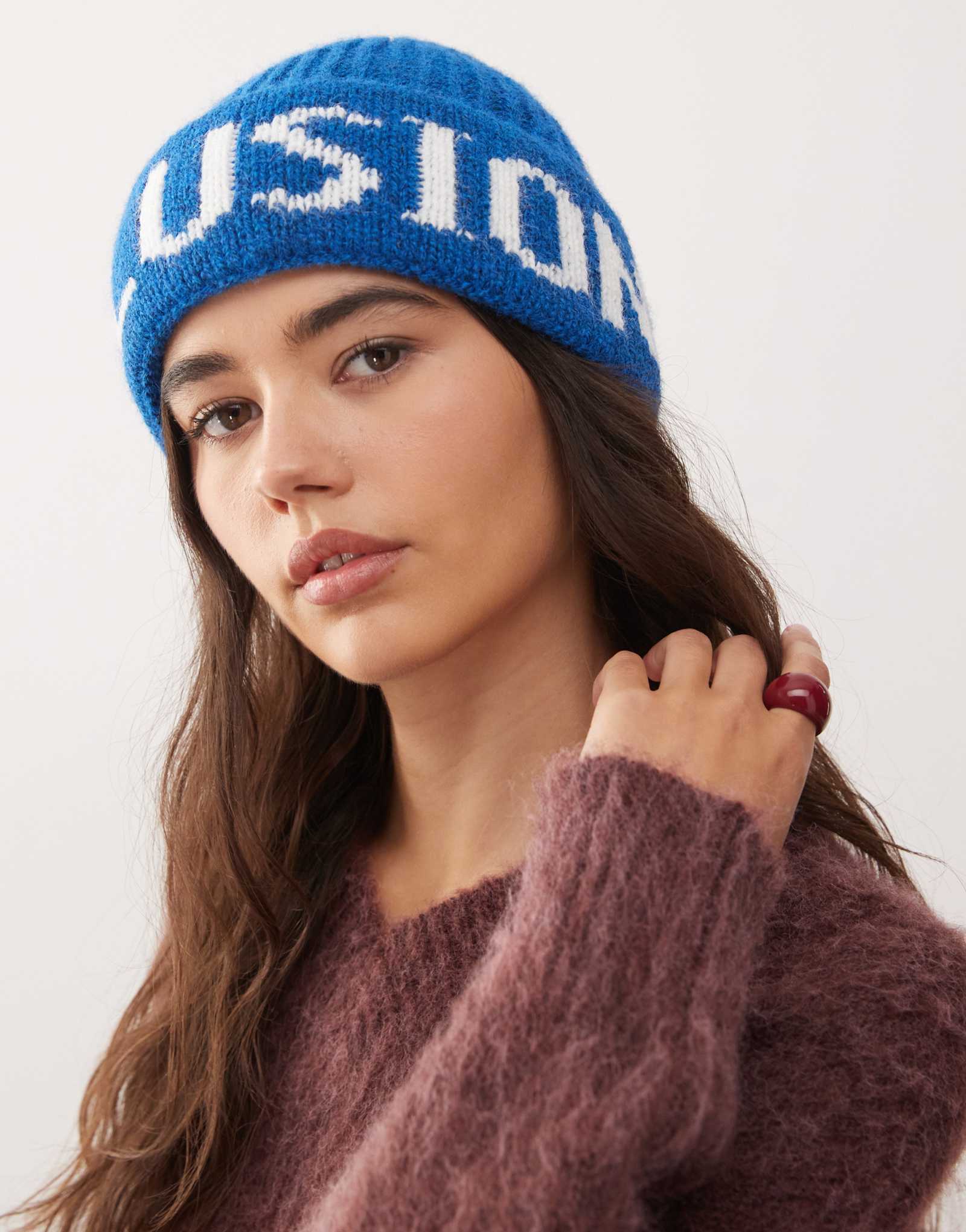 Пушистая шапочка с логотипом COLLUSION синего цвета