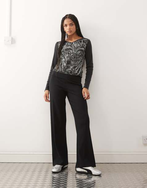 COLLUSION foldover waist ribbed flare yoga pants in black - view 1