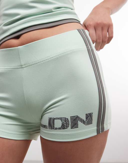 COLLUSION football booty short in green co-ord, 4 of 5
