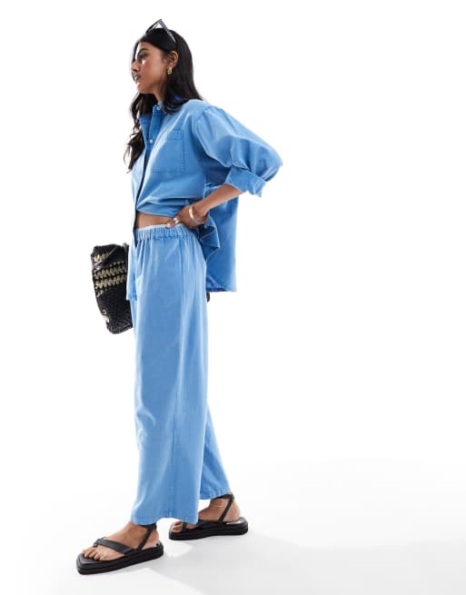 COLLUSION - Geweven strandbroek met rechte pijpen en boxer-taille in blauw