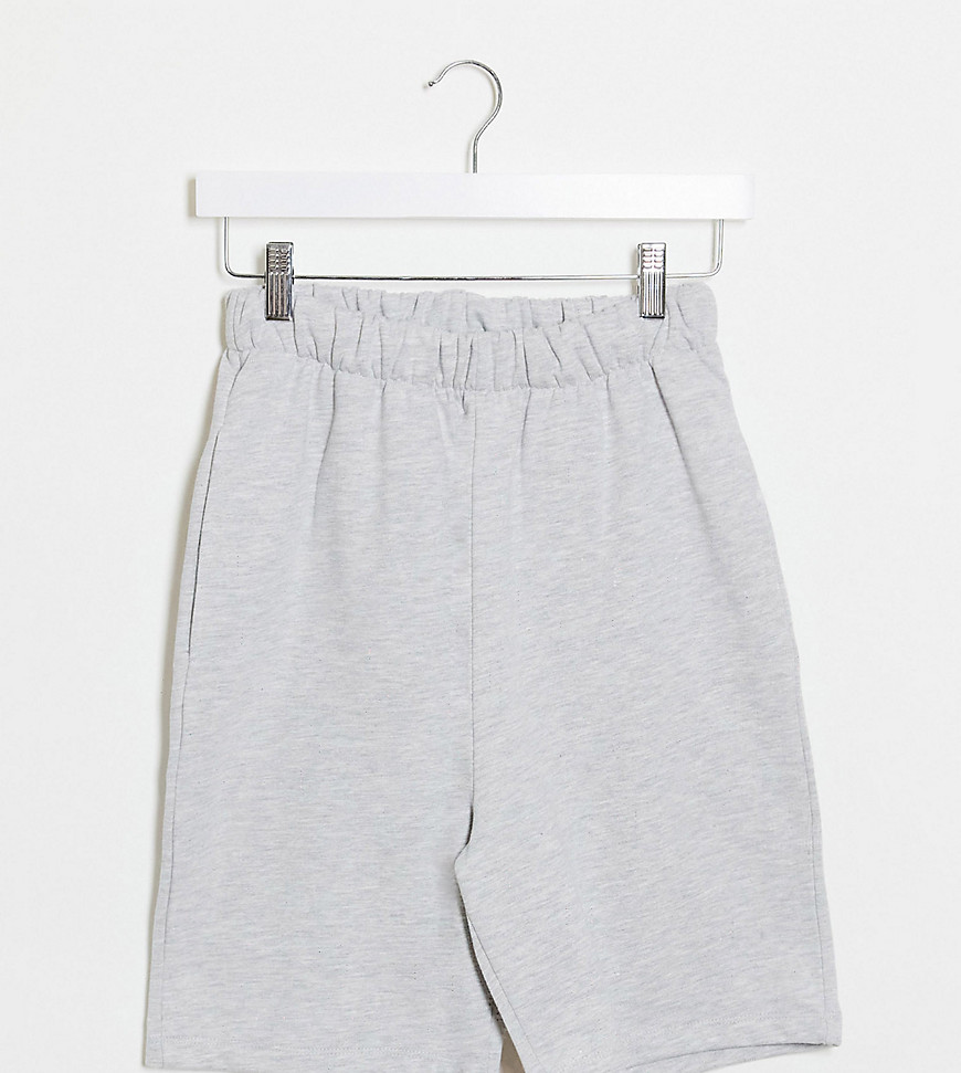 COLLUSION – Grå jersey-shorts i longline-modell