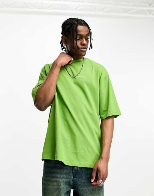 COLLUSION – Grön t-shirt med texttryck