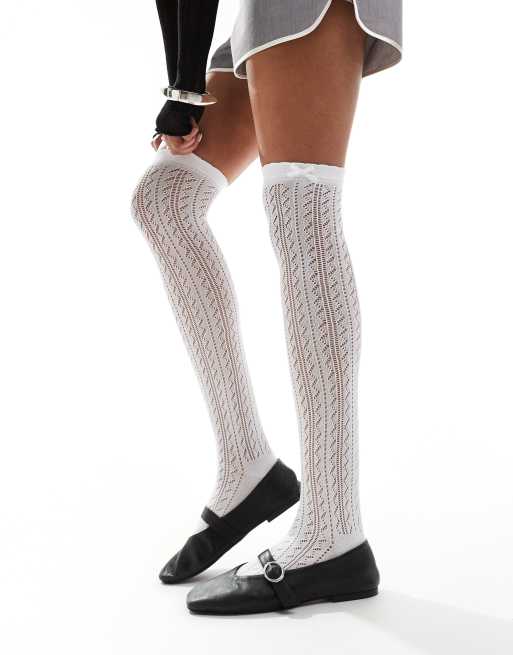 COLLUSION high knee pointelle sock with bow in white