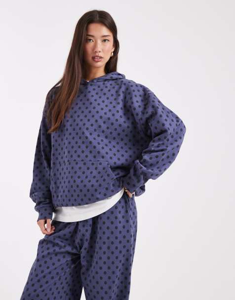 COLLUSION - Hoodie in blauw met stippen - view 1