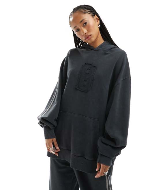 COLLUSION - Hoodie met wassing en applicatie op de voorkant in grijs