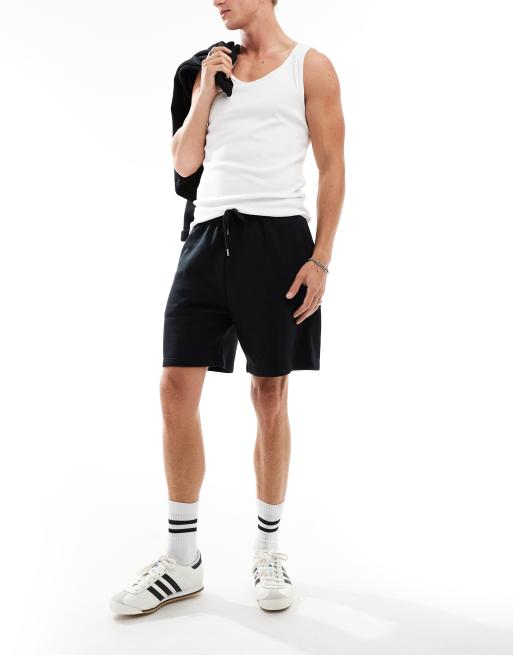 COLLUSION jersey shorts in black