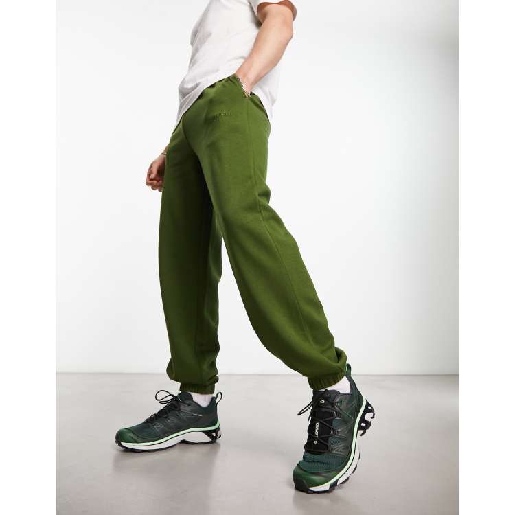 COLLUSION jogger with embroidered logo in dark green