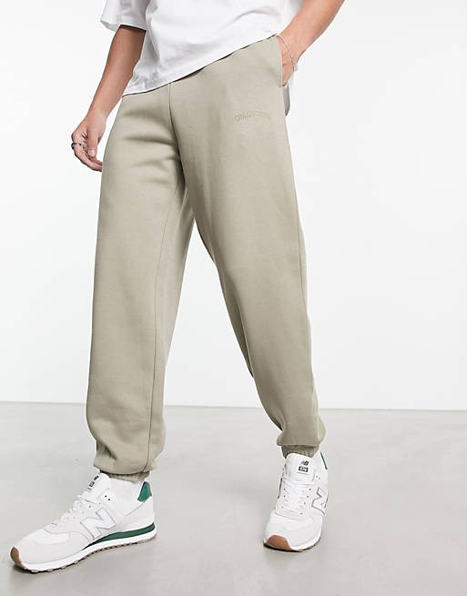 COLLUSION jogger with embroidered logo in washed khaki