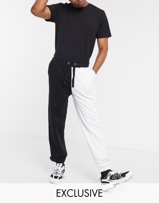 COLLUSION - Joggers colorblock neri e bianchi 