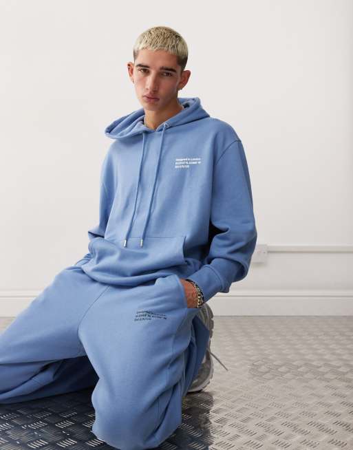 COLLUSION - Joggers comodi stile skate blu con coordinate, 4 di 5