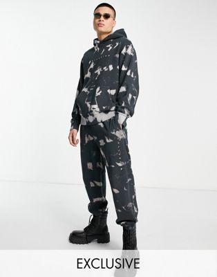 COLLUSION joggers in black tie dye with embroidered logo co-ord