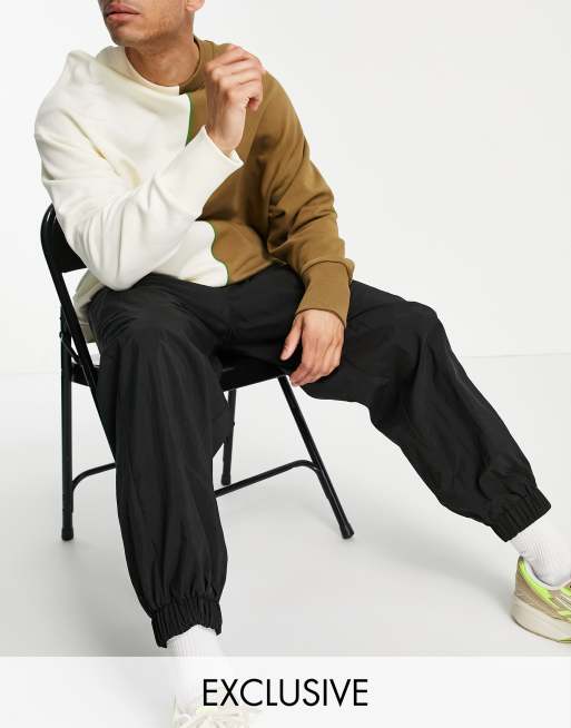 COLLUSION - Joggers in nylon neri