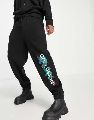 COLLUSION joggers with logo X dragon print in black co ord Compare Closer