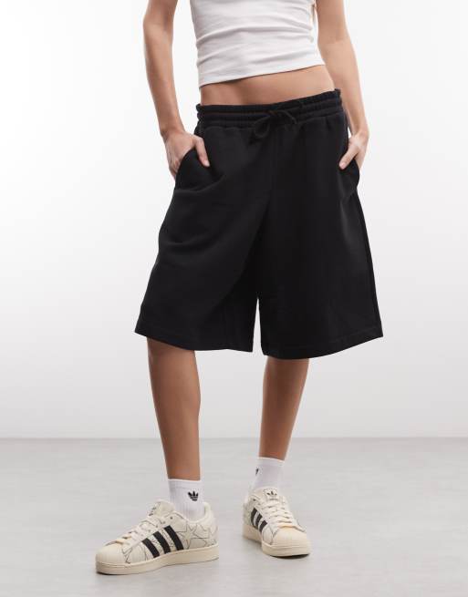 COLLUSION - Joggingshort met lange pasvorm in zwart, 2 van 5