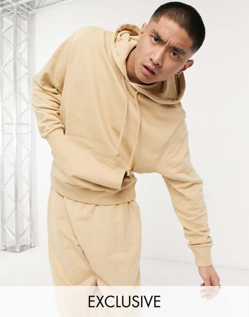 COLLUSION – Kapuzenpullover in Sand