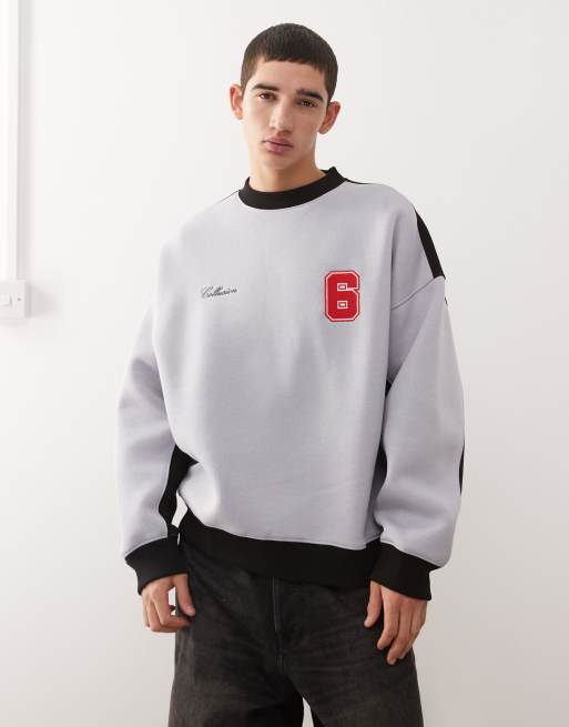 COLLUSION – Kastiges Sweatshirt im Football-Stil in Grau und Schwarz
