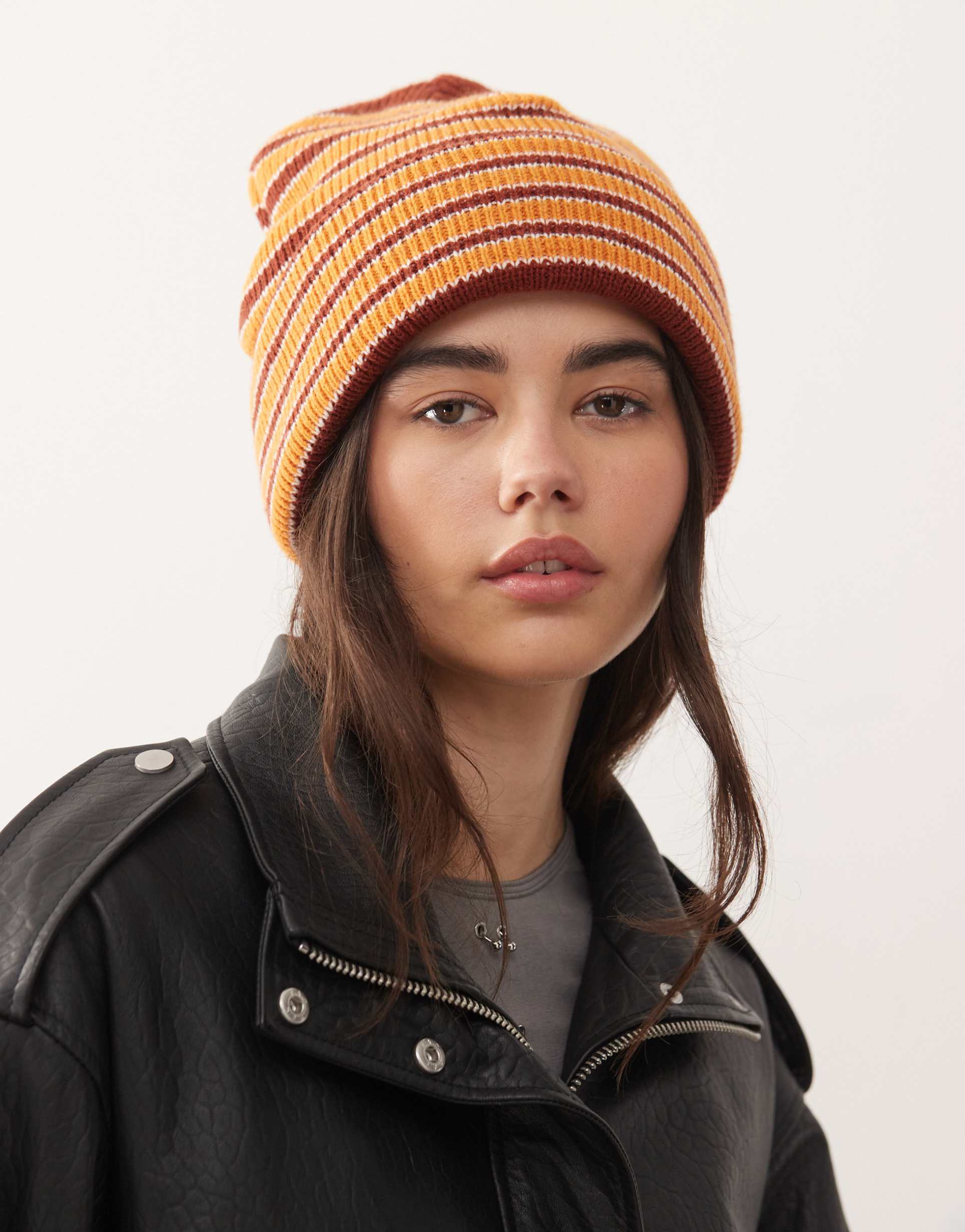 collusion knit beanie in brown multi stripes