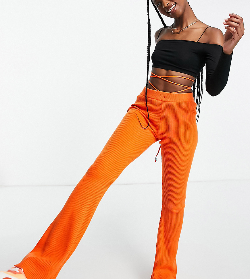 COLLUSION knitted flare with tie waist detail in orange-White