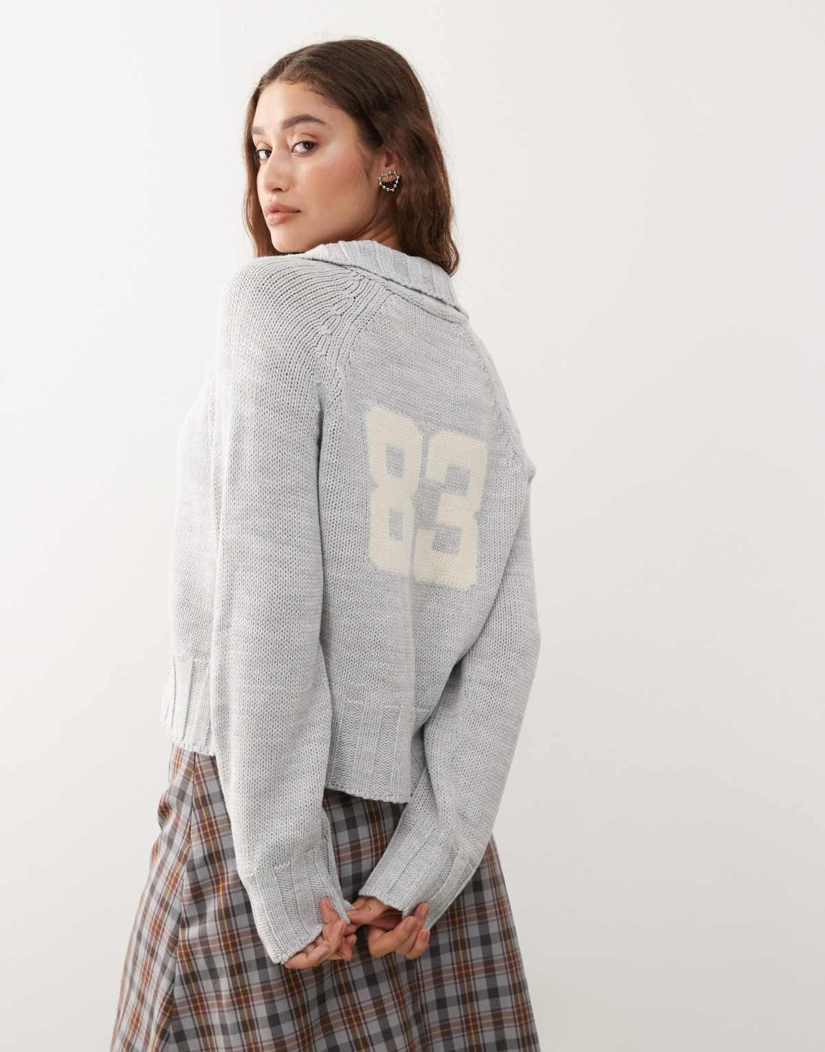 COLLUSION knitted raglan zip through with varsity number detail in grey