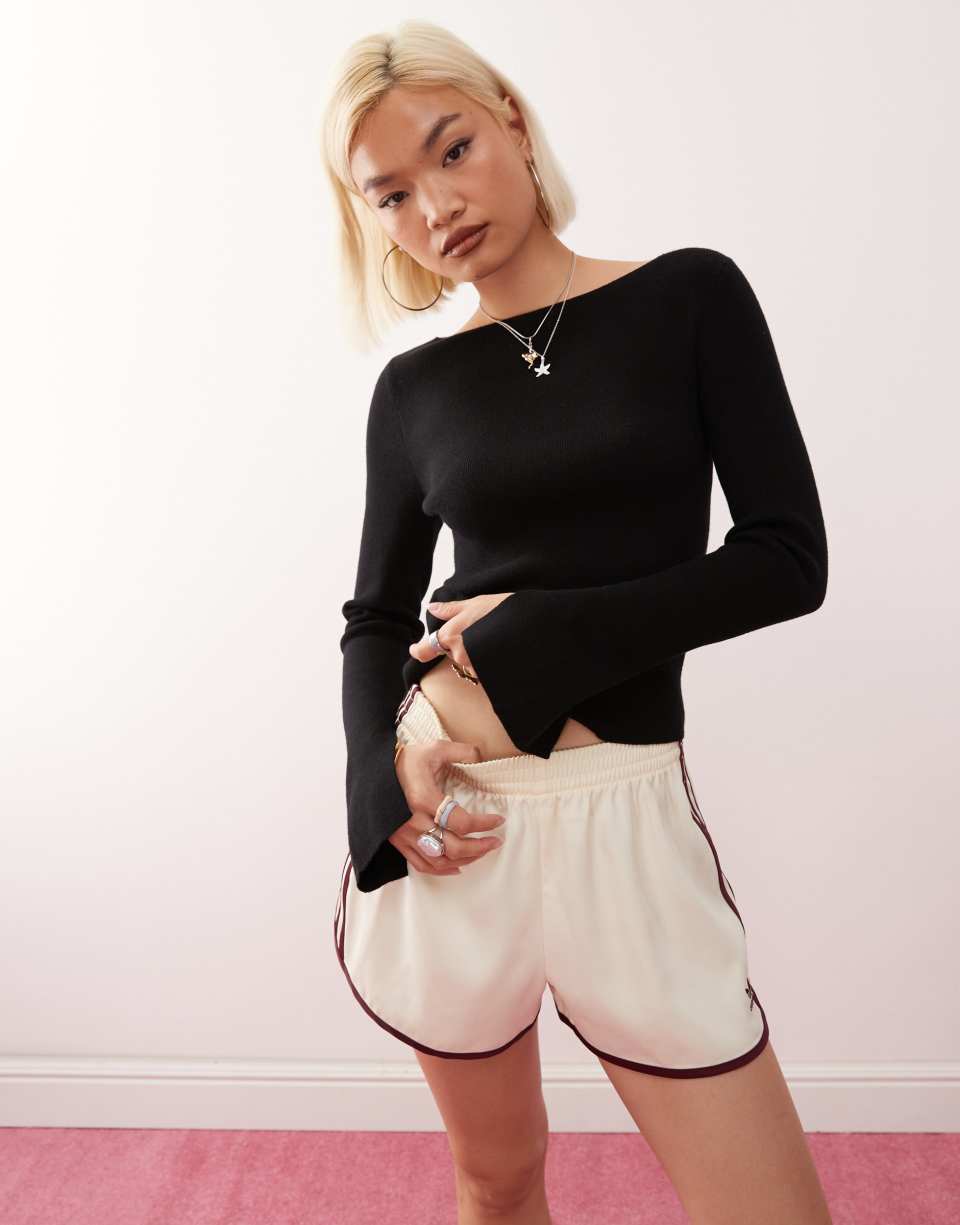 Knitted slash neck top