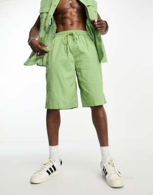 COLLUSION linen beach short in light green