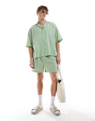 COLLUSION linen look beach shorts in sage green (part of a set)