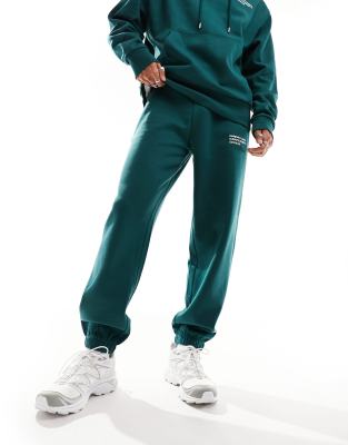 Collusion Logo Sweatpants In Green