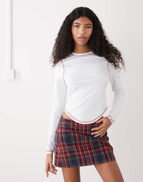 COLLUSION long sleeve contrast stitch curved hem top in light blue - view 1